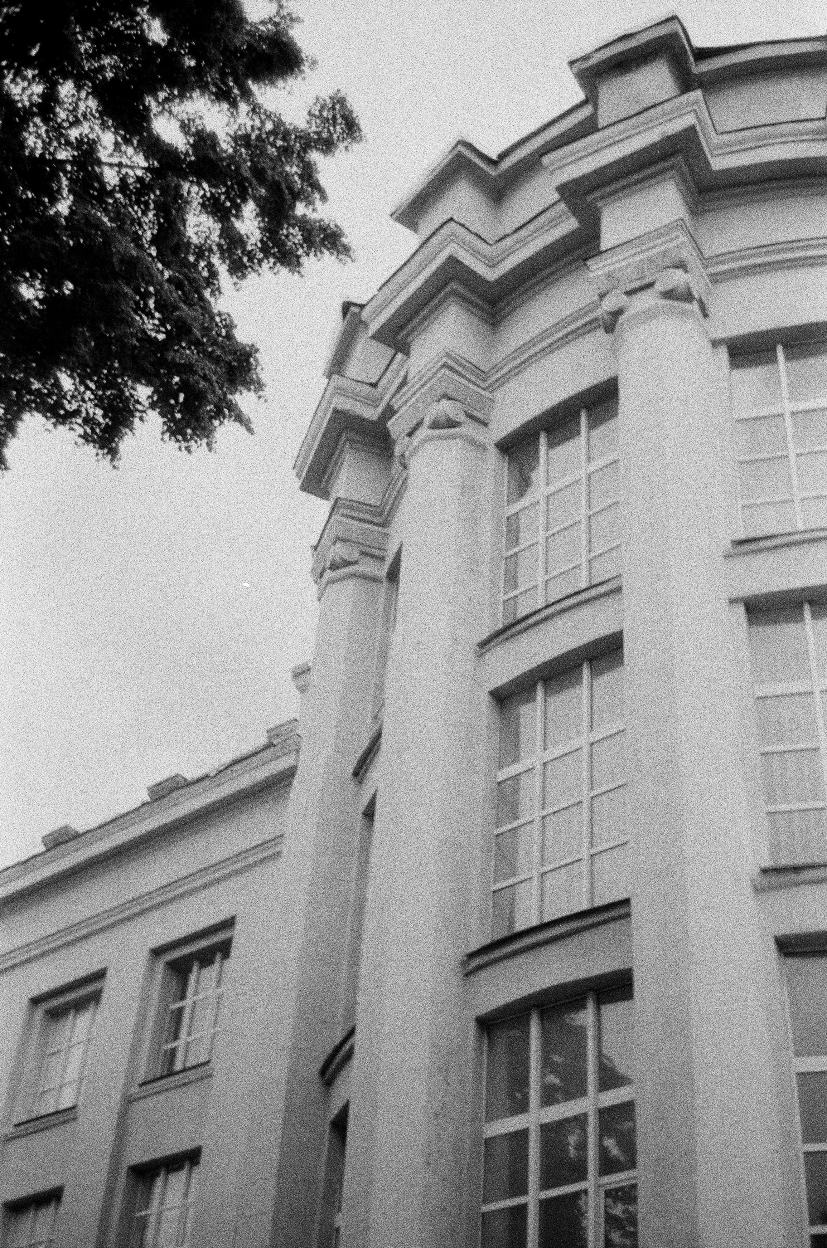 grayscale photo of concrete building